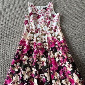 Floral sleeveless dress with flared bottom, size 8